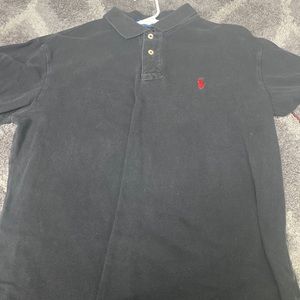 Black polo by Ralph Lauren- size L
